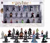 A display box containing multiple Harry Potter character figurines, with additional figurines arranged in front of the box. Produktbild-Vorschau