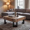 A living room scene featuring a sectional sofa and a wooden coffee table. Voir les images du produit