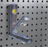 A flashlight is mounted on a pegboard. Produktbild-Vorschau