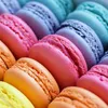A close-up view of a variety of colorful macarons. Náhled obrázku produktu