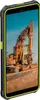 A rugged smartphone is displayed in front of a construction scene with an excavator. Náhled obrázku produktu