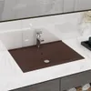 A close-up shot of a modern bathroom sink with a faucet. Anteprima dell’immagine prodotto