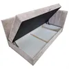A beige upholstered bed frame with the storage compartment open, showing the interior. Náhled obrázku produktu