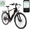 A black and gold electric bicycle is shown against a white background, with a smartphone displaying a navigation app next to it. Produktbild-Vorschau