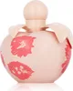 A close-up studio shot of a pink perfume bottle with coral floral patterns. Anteprima dell’immagine prodotto
