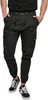 A person wearing black cargo pants and black and white sneakers. Produktbild-Vorschau