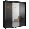 A black wardrobe with sliding doors and drawers, featuring a large central mirror. A chair is reflected in the mirror. Náhled obrázku produktu