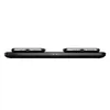 A black wireless charging pad with two smartphones placed on it. Voir les images du produit