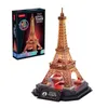 A 3D puzzle of the Eiffel Tower, presented in its packaging and as a built model. Voir les images du produit