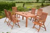 A wooden garden furniture set on a paved patio with a garden in the background. Produktbild-Vorschau