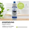 A bottle of cleaning concentrate is shown on a wooden surface with a blurred background of a kitchen or bathroom. Produktbild-Vorschau