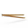 A pair of wooden tongs on a white background. Produktbild-Vorschau