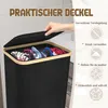 A hand is shown opening the lid of a black laundry basket filled with clothes. Text overlays describe features. Voir les images du produit