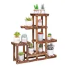 A wooden plant stand with multiple tiers holding various potted plants. Anteprima dell’immagine prodotto