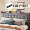 A bed with a headboard featuring a shelf and USB charging ports. Anteprima dell’immagine prodotto