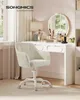 A vanity desk with makeup and a chair in a bedroom setting. Produktbild-Vorschau