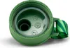 Close-up view of the inside of a green bottle cap with a green and striped strap attached. Voir les images du produit