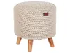 A beige knitted pouf with wooden legs against a white background. Náhled obrázku produktu