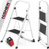A white folding step stool with two steps is shown against a white background. The stool is presented in two views: one open and one folded. A close-up of a non-slip foot pad is also visible. Produktbild-Vorschau