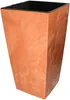 A tall, square planter with a tapered shape and a textured, terracotta-like finish. It has a black inner liner. Voir les images du produit