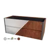 A raised garden bed with a split design, half silver and half rusted metal, shown on a white background. Below the planter are three icons representing a color change process: a silver circle, a cloud with rain and sun, and a brown circle. Produktbild-Vorschau