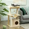 A cat is resting on a multi-level cat tree in a living room setting. Anteprima dell’immagine prodotto