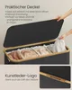 A laundry basket with its lid open, showing internal compartments and laundry. Text overlays describe features. Produktbild-Vorschau