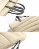 Collage of close-up shots of a beige laptop bag. Produktbild-Vorschau