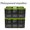 Two stacked foldable storage crates with green rims on a white background. Produktbild-Vorschau