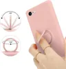 A hand holding a pink phone case with a ring holder attached, with diagrams showing the ring's movement. Náhled obrázku produktu