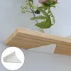 A white bracket is shown attached to a wooden shelf, with a vase of flowers in the background. A smaller inset image shows a close-up of the bracket. Produktbild-Vorschau