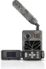 A camouflage-patterned trail camera with its screen open, displayed against a white background. Náhled obrázku produktu