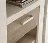 A close-up view of a drawer handle on a piece of furniture. Produktbild-Vorschau