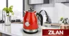 A red kettle on a kitchen counter. Podgląd zdjęcia produktu