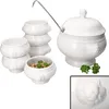 A white ceramic soup tureen set with a ladle and individual bowls, decorated with lion head motifs. Produktbild-Vorschau