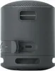A close-up, rear view of a black SONY SRS-XB100 Bluetooth speaker. Voir les images du produit