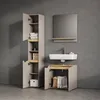 A modern bathroom vanity and storage cabinet set against a textured gray wall. Produktbild-Vorschau