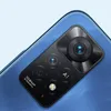 Close-up of the camera module on the back of a blue smartphone. Náhled obrázku produktu