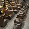 Interior of a restaurant or bar with wine racks, booths, and tables. Produktbild-Vorschau