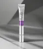 A product shot of an eye cream tube against a grey background with shadows. Produktbild-Vorschau