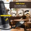 Close-up of a portable espresso machine with charging cable and various charging options illustrated. Produktbild-Vorschau