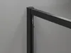 A close-up view of a black metal frame, likely part of a shower enclosure, against a plain gray wall. Produktbild-Vorschau