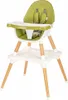 A green and white high chair with wooden legs, shown against a white background. Produktbild-Vorschau