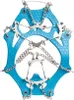 A close-up, isolated view of a blue ice cleat or crampon. Anteprima dell’immagine prodotto