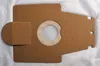 A flat lay of a brown paper vacuum cleaner bag with a circular opening and a flap. Produktbild-Vorschau