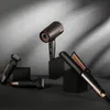 A collection of grooming appliances arranged on a dark surface with a gray background and dramatic lighting. Produktbild-Vorschau