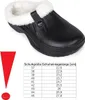 A black clog with white fur lining and a size chart. Produktbild-Vorschau