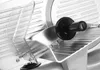 A close-up view of a food slicer machine. Náhľad obrázku produktu