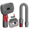 A set of grooming tools for pets, including a vacuum attachment for hair and brushes. Produktbild-Vorschau
