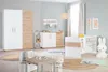 A nursery room with a wardrobe, changing table, crib, and a small table with chairs. Produktbild-Vorschau